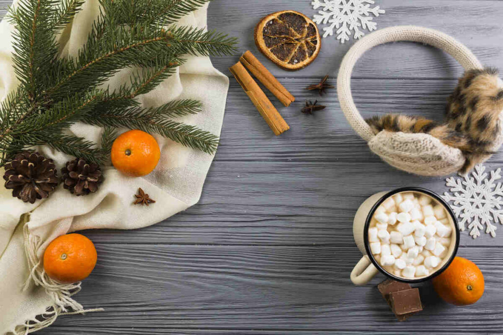 A cozy scene featuring cinnamon sticks and a playful cat sitting beside them, with a warm and inviting atmosphere. The cat looks curious and content, surrounded by the earthy aroma of cinnamon.